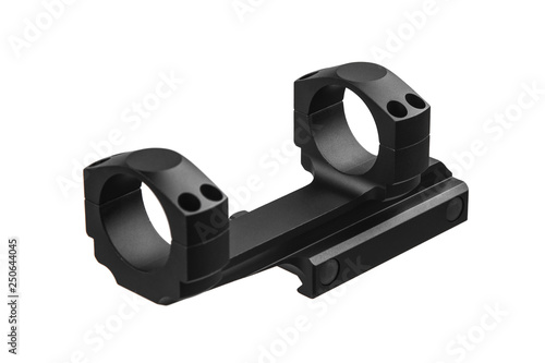 Quick disconnect mount made for holding a scope on a rifle isolated on white back. Quick Release Sniper Cantilever Scope Mount. photo