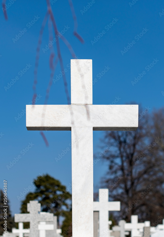 Graves with crosses at cemetery