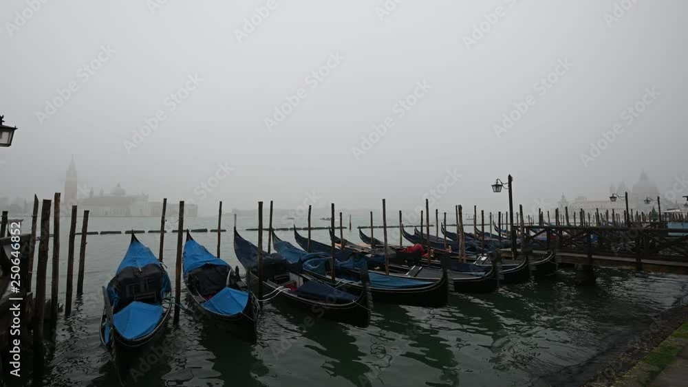 Venice, Italy - Palaces and Gondolas of the San Marco Basin wrapped in fog Venice, Italy - Palaces and Gondolas of the San Marco Basin wrapped in fog