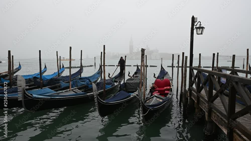 Venice, Italy - Palaces and Gondolas of the San Marco Basin wrapped in fog Venice, Italy - Palaces and Gondolas of the San Marco Basin wrapped in fog