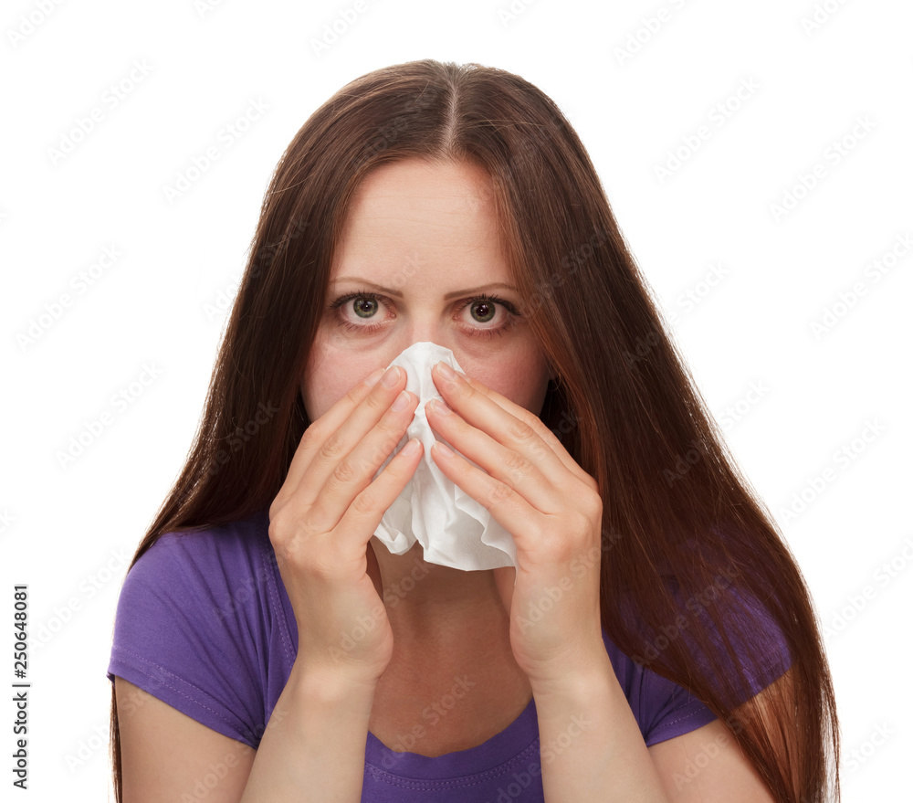 Young woman suffering with allergy isolated on white. The concept of the problem of allergic reactions Young woman suffering with allergy isolated on white. The concept of the problem of allergic reactions