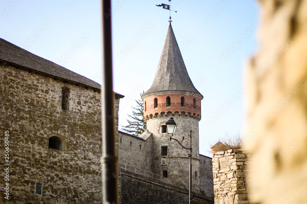 Old architecture and stones. Kamyanets Podilsky castle. Daily photos. Details of the castle. Wooden beams. Stone walls and fences. Towers and corridors. Patio.