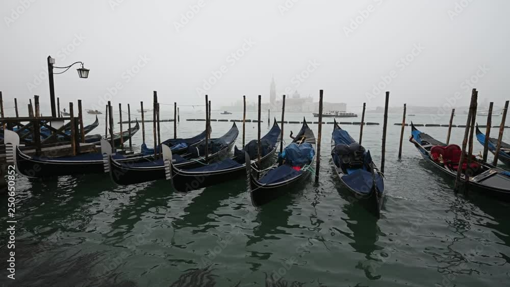 Venice, Italy - Palaces and Gondolas of the San Marco Basin wrapped in fog Venice, Italy - Palaces and Gondolas of the San Marco Basin wrapped in fog