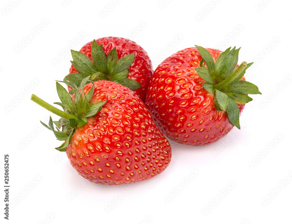 Ripe strawberries from the garden, isolated on a white background Ripe strawberries from the garden, isolated on a white background