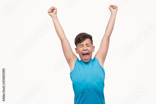 Boy screaming and celebrating success