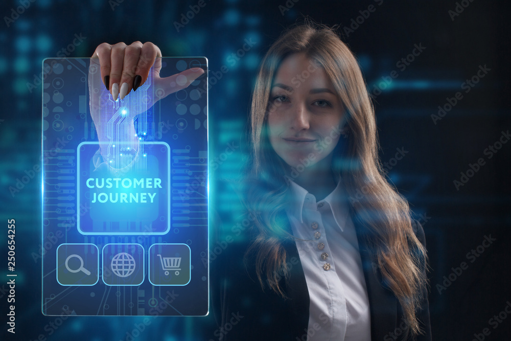 The concept of business, technology, the Internet and the network. A young entrepreneur working on a virtual screen of the future and sees the inscription: Customer journey The concept of business, technology, the Internet and the network. A young entrepreneur working on a virtual screen of the future and sees the inscription: Customer journey