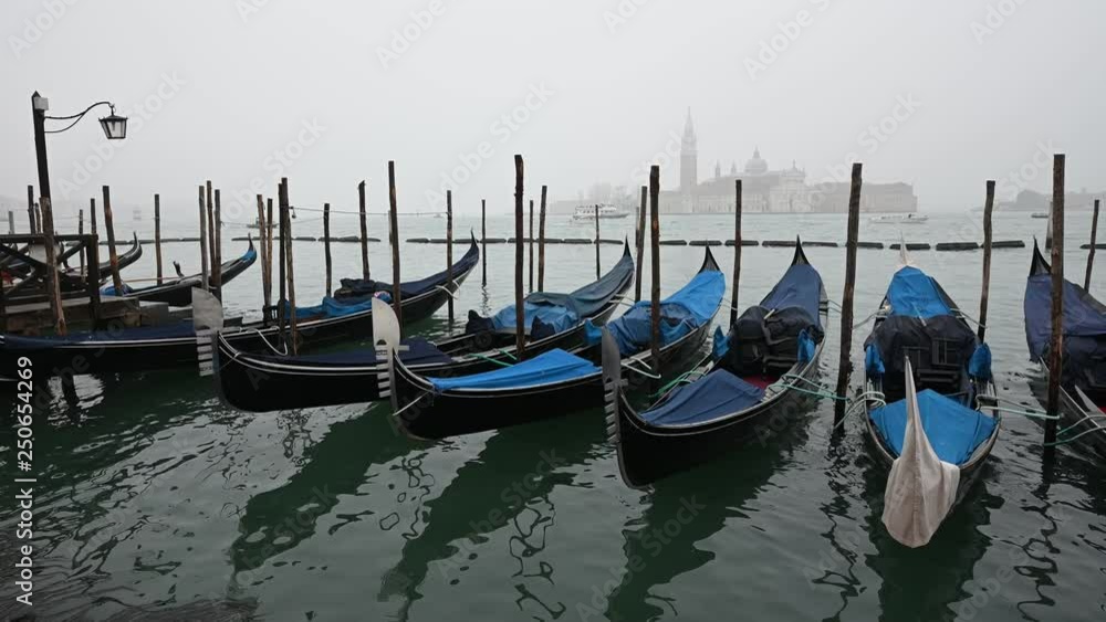 Venice, Italy - Palaces and Gondolas of the San Marco Basin wrapped in fog Venice, Italy - Palaces and Gondolas of the San Marco Basin wrapped in fog