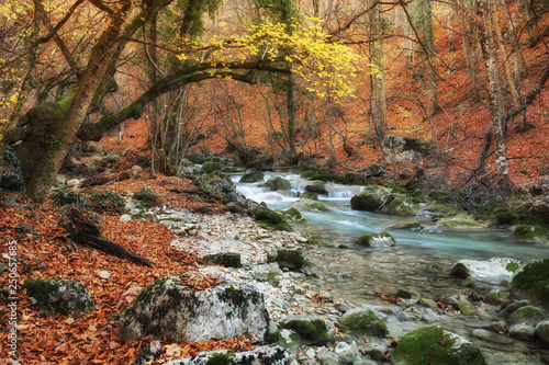 Beautiful view of Yew waterfall, waterfall in mountains in autumn, Grand Crimean Canyon, Crimea