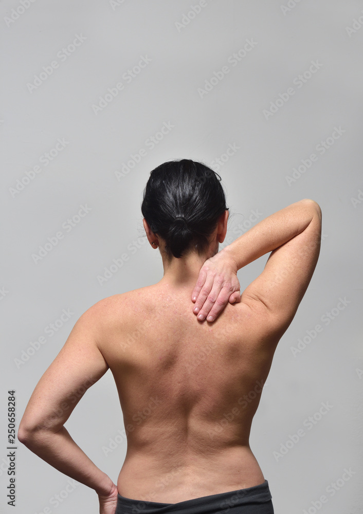 middle-aged woman with shoulder pain middle-aged woman with shoulder pain