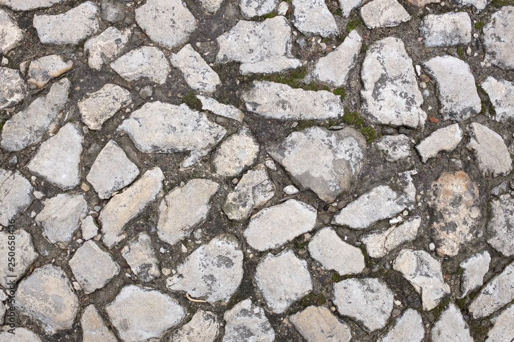 Texture of a stone wall. Part of a stone wall, for background or texture. Closeup Texture of a stone wall. Part of a stone wall, for background or texture. Closeup