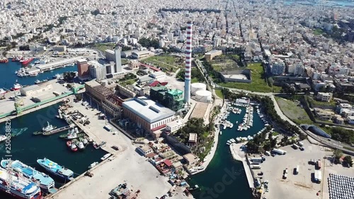 Aerial drone video of Public Hellenic Transportation and Cargo facilities in industrial area of Keratsini, Piraias, Attica, Greece photo