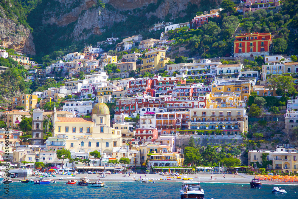 View from the sea on the cozy and cute town Positano on the Amalfi Coast, Italy. 