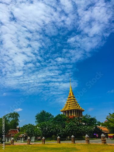 Mondop of Wat Phra Phutthabat pagoda  temple of Buddha s footprint  under blue sky and white cloud background at Muang Boran  Samut Prakarn  Thailand.