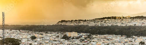 Panorama of the Sunset and Richmond districts of San Francisco at sunset.