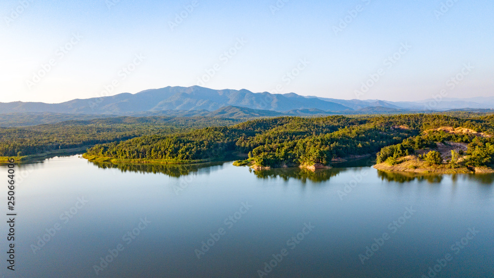 Pong Chor Reservoir in Mae Wang National Park Chiang Mai, Thailand. Photo in aerial view by drone with beautiful nature.  Abstract of peaceful, peace wallpaper background.