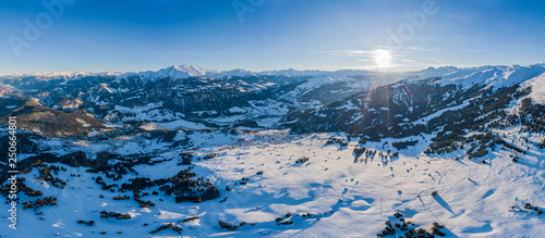 Laax Panorama of the village in the winter mountains covered with snow. Winter landscape. Sun shining. The concept of freedom and solitude.
