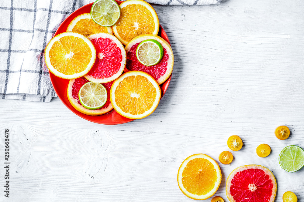sliced citrus fruits on kitchen background top view mockup sliced citrus fruits on kitchen background top view mockup
