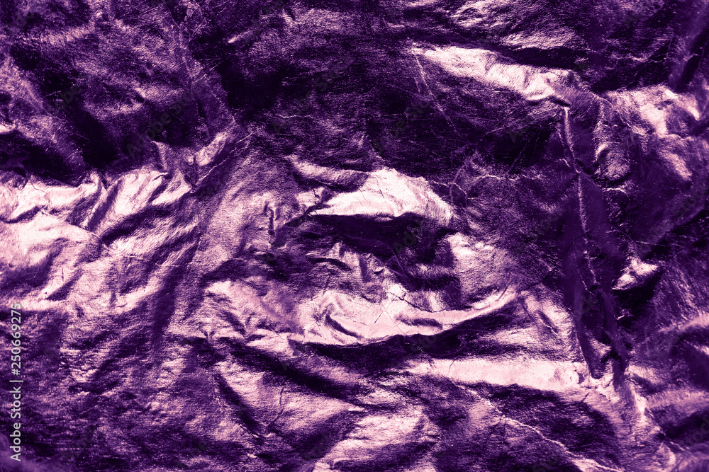 Purple crumpled reflective background. Purple crumpled reflective background.