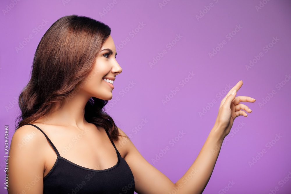 woman showing copyspace or something woman showing copyspace or something