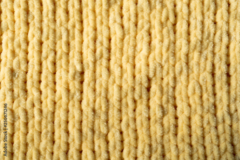 Background texture of microfiber yellow yarn Background texture of microfiber yellow yarn