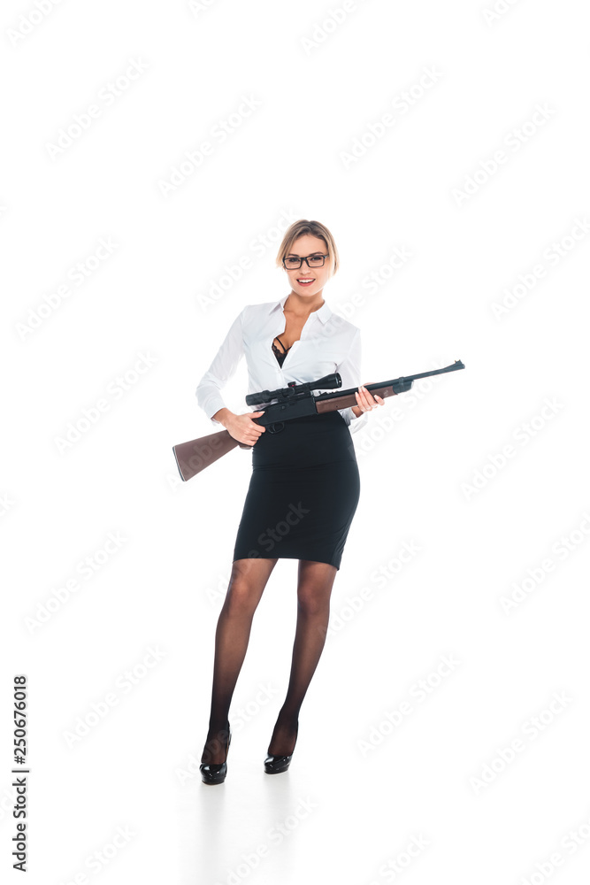 blonde teacher in blous with open neckline, glasses and skirt holding rifle on white background blonde teacher in blous with open neckline, glasses and skirt holding rifle on white background