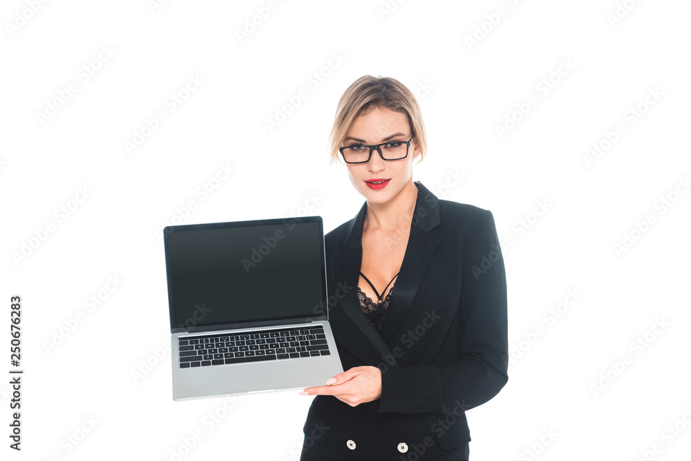 attractive businesswoman in black formal wear holding laptop with blank screen isolated on white attractive businesswoman in black formal wear holding laptop with blank screen isolated on white