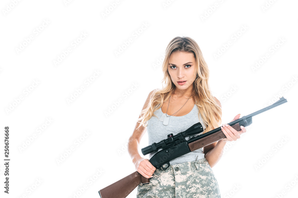 attractive woman in grey military clothes with weapon isolated on white