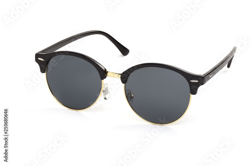 Stylish women's sunglasses on a white background. In a half turn. photo