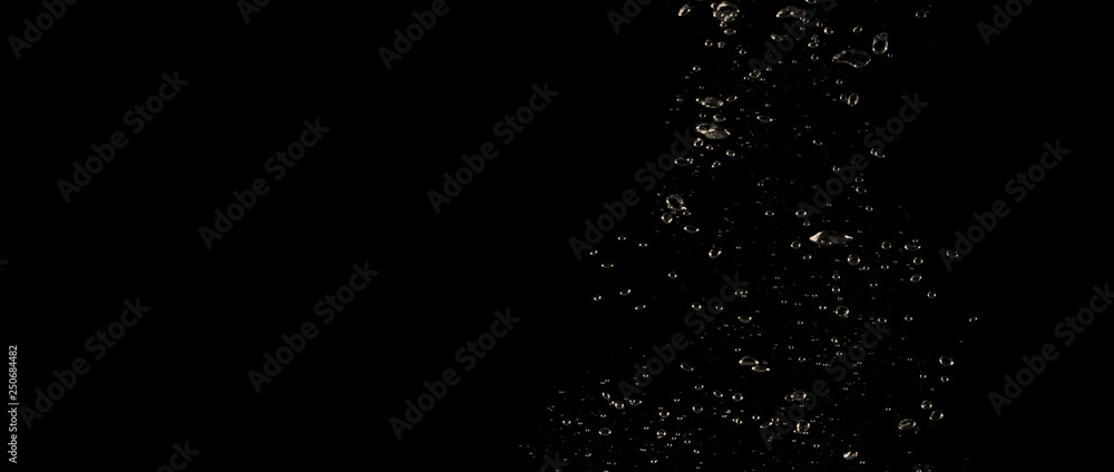 Extream close-up images of water bubbles or soda or liquid texture that splashing and floating up to surface like a explosion in black color background for refreshing carbonate drink concept. Extream close-up images of water bubbles or soda or liquid texture that splashing and floating up to surface like a explosion in black color background for refreshing carbonate drink concept.