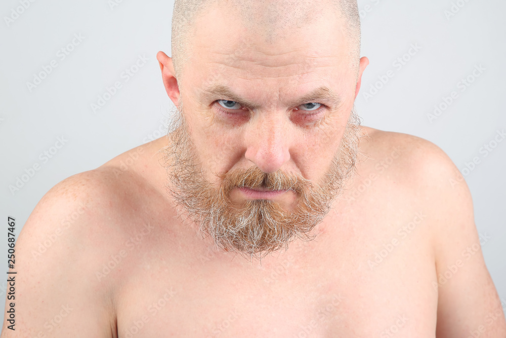 Obraz premium portrait of a bearded man on a light background