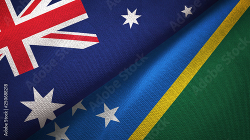 Australia and Solomon Islands two flags textile cloth, fabric texture