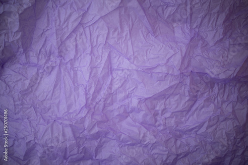 Background made of violet crumpled paper