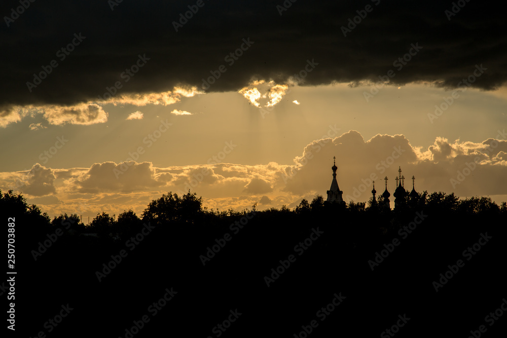 sunset over the church