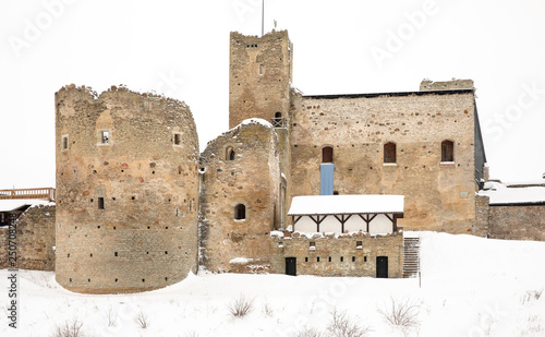 ruins of old castle in Rakvere, Estonia during winter season photo