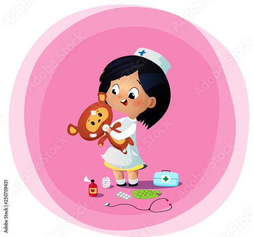 Cute little girl plays doctor with toy bear.