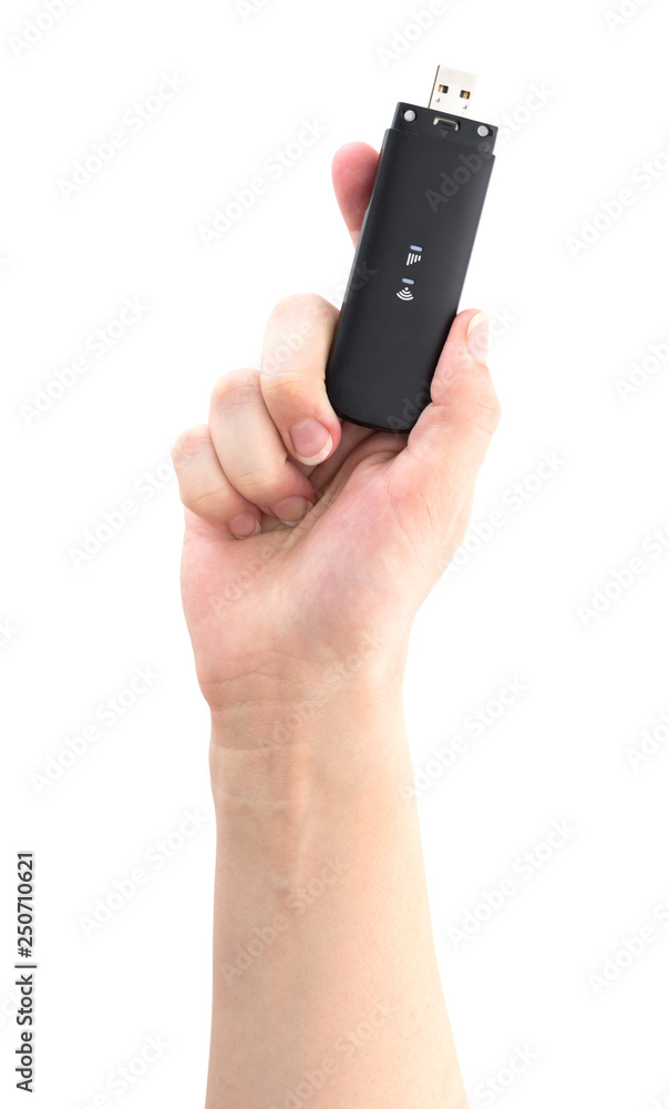 Portable usb modem on a white background. 4g modem in hand on a white background. Portable usb modem on a white background. 4g modem in hand on a white background.