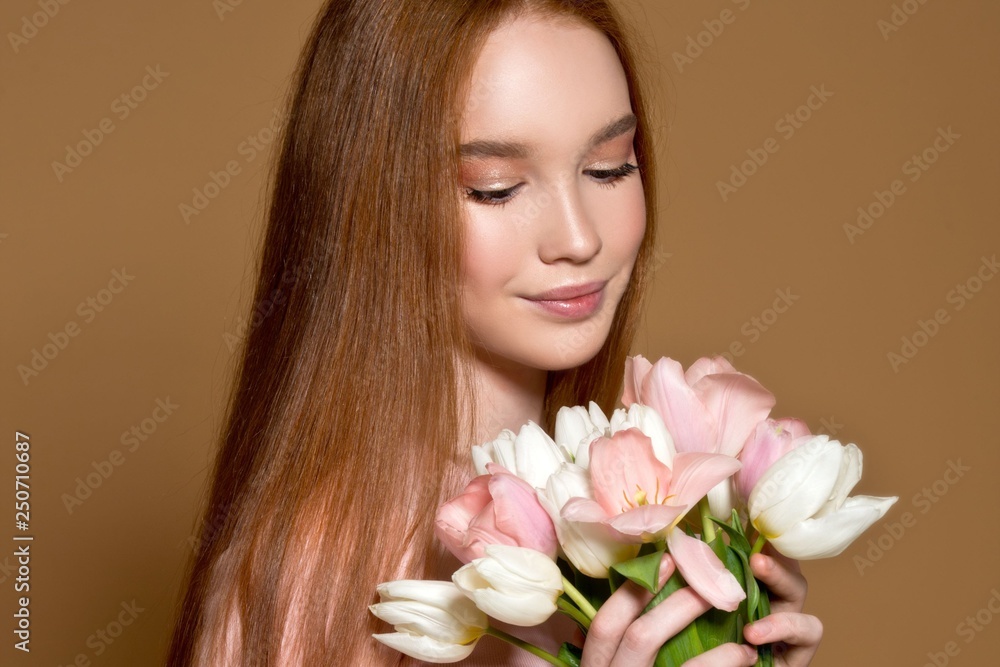 Woman with tulips bouquet and gift box. Birthday. March 8. Mother day. Woman with tulips bouquet and gift box. Birthday. March 8. Mother day.