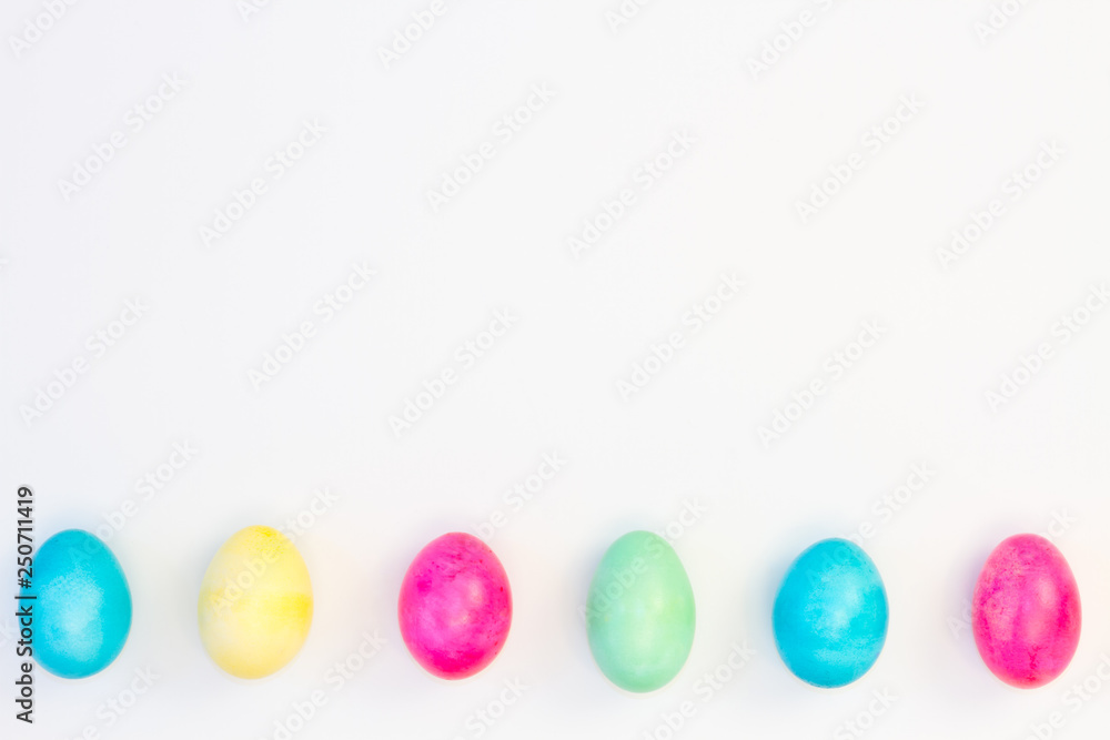 Six colored eggs on white background Six colored eggs on white background