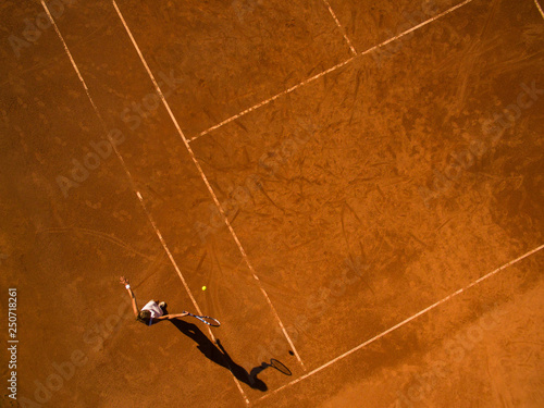 Fotografie Female tennis player on the court