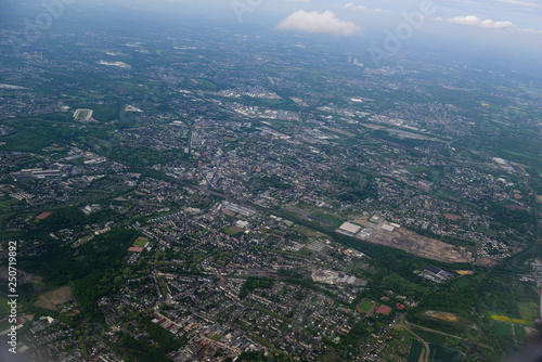 Fabulous panoramic view from airplane, Essen, Germany, flying airplane. © vahanabrahamyan