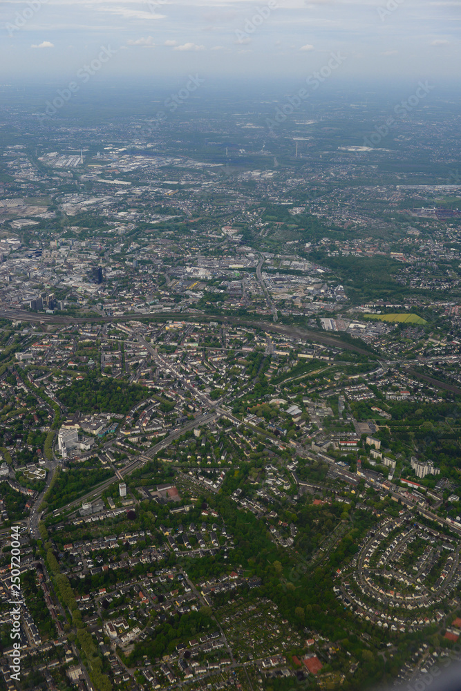 Fabulous panoramic view from airplane, Essen, Germany, flying airplane.