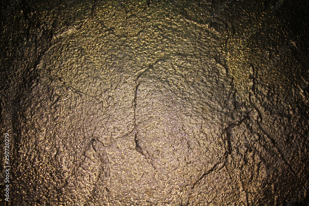 abstract colorful grunge background. The texture of the wall of decorative stucco. modern and fashionable clothes for walls