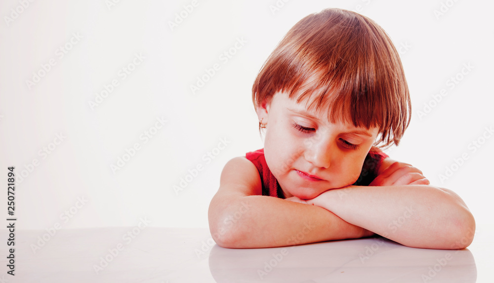Portrait of bored little cute child gir showing very lazy unhappy and tired gesture Portrait of bored little cute child gir showing very lazy unhappy and tired gesture