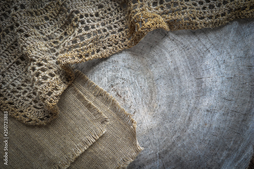 Background from cross section of tree trunk and natural linen napkins