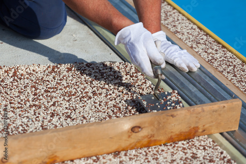 Laying the floor around the outdoor pool.