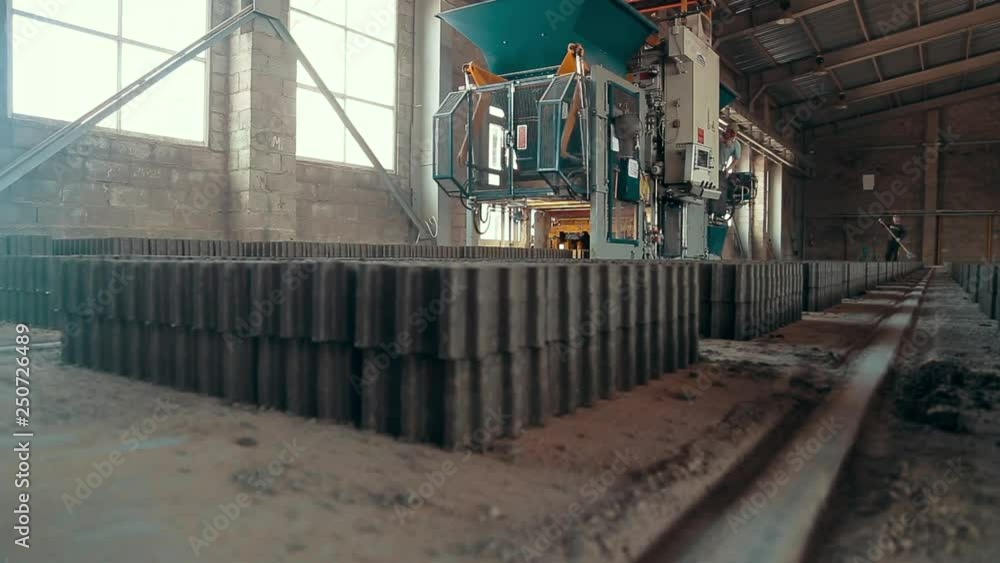 Paving Slabs Factory. Tiles Piled In Pallets. Warehouse Paving Slabs In The Factory For Its Production Prores Codec Paving Slabs Factory. Tiles Piled In Pallets. Warehouse Paving Slabs In The Factory For Its Production Prores Codec