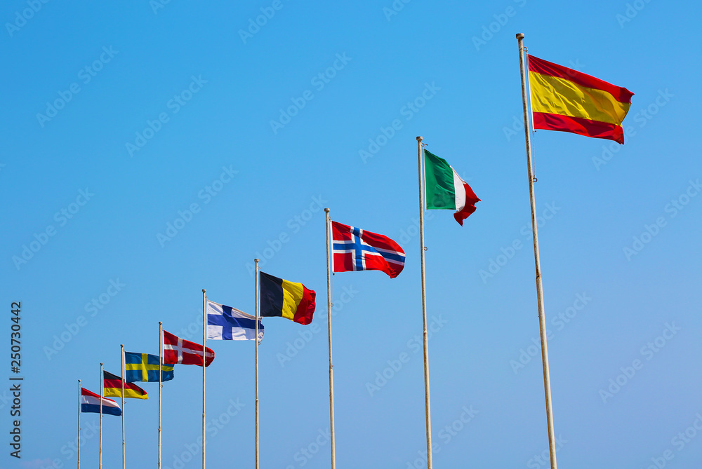 Flags of European countries waving on blue sky Flags of European countries waving on blue sky