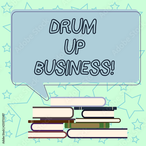 Handwriting text writing Drum Up Business. Concept meaning increase deanalysisd activity or get support for something Uneven Pile of Hardbound Books and Blank Rectangular Color Speech Bubble