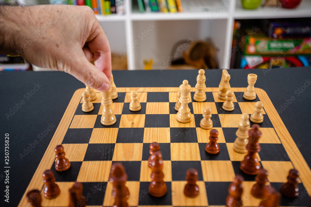 Business man moving chess figure with team behind. strategy or leadership concept. Business man moving chess figure with team behind. strategy or leadership concept.