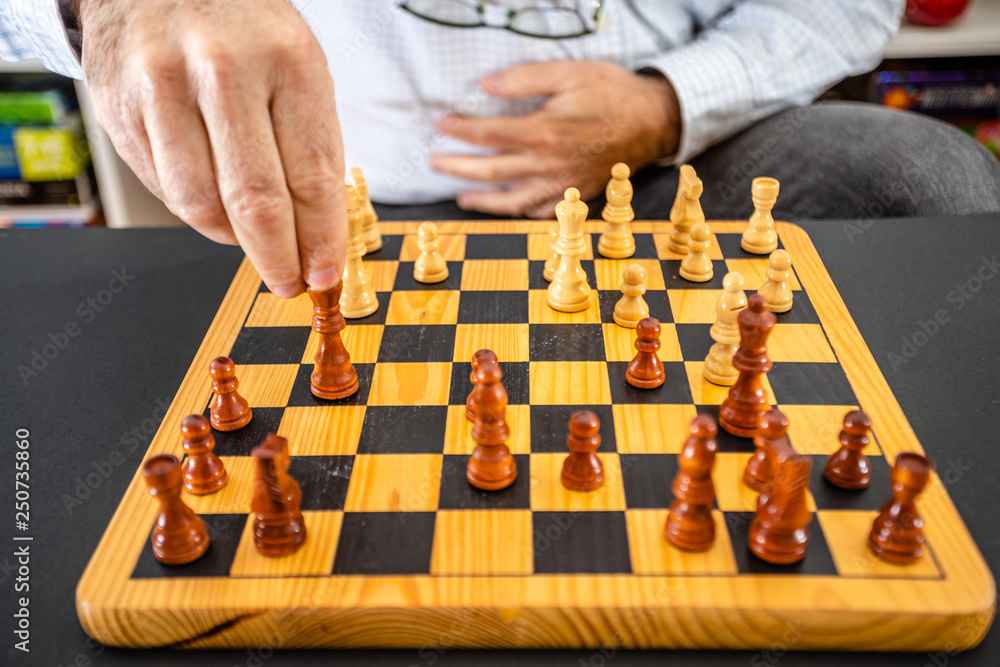 Business man moving chess figure with team behind. strategy or leadership concept. Business man moving chess figure with team behind. strategy or leadership concept.